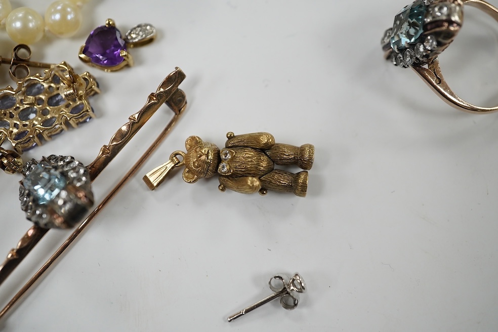 A group of assorted mainly modern 9ct and gem set jewellery including pendants, rings, bracelet, fob seal, ear studs, bar brooches, etc. and a single strand cultured pearl necklace. Condition - poor to fair to good.